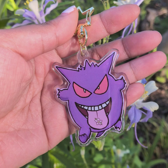 gengar keychain held in hand